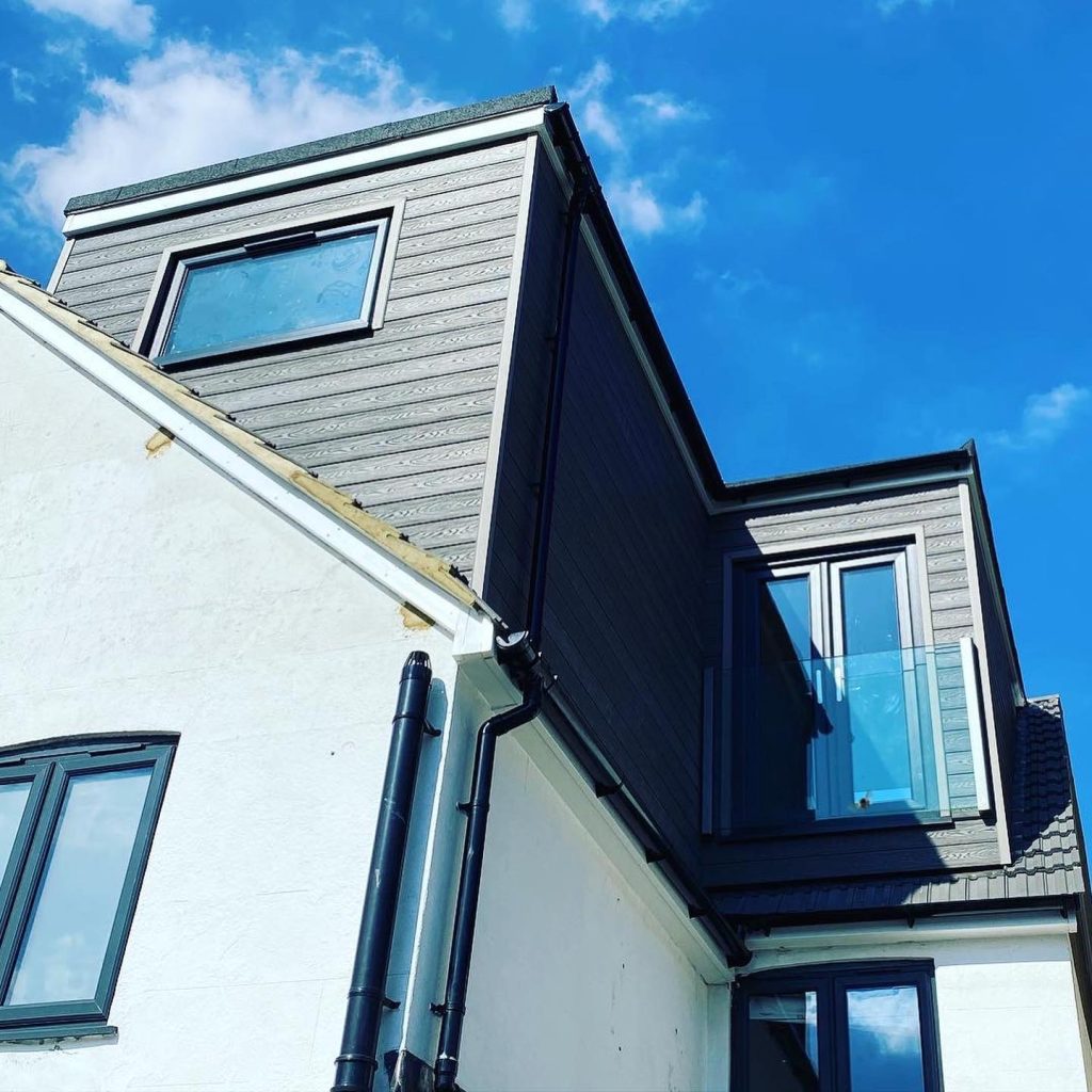 Grey Composite Cladding on a house - Assured Composite